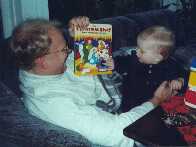Is he going to open the book or not???