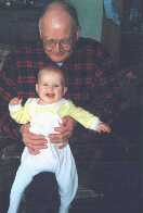 It is allot of fun bouncing at grandpa's knee...